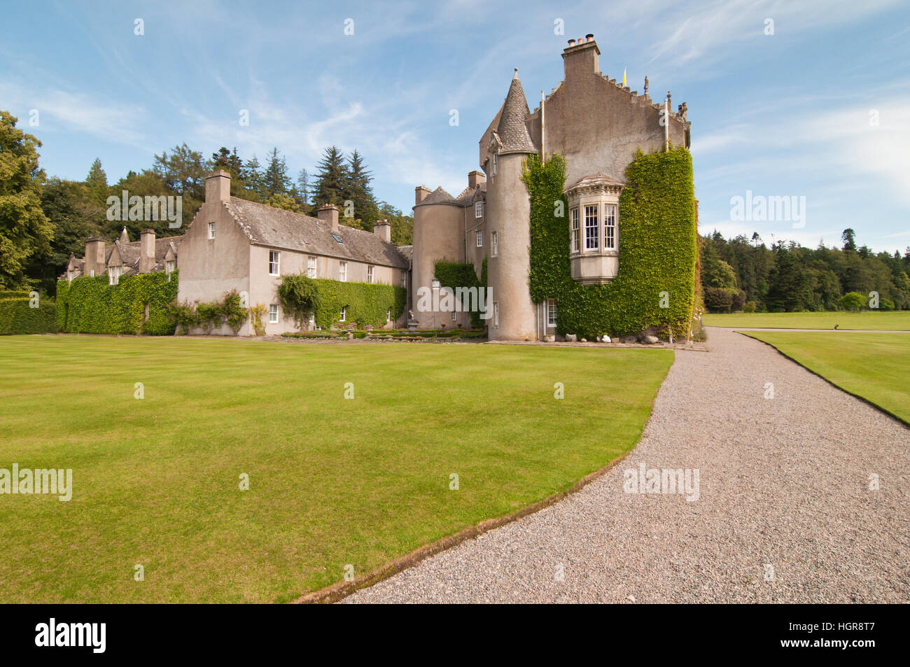 Green grass and blue sky at Ballindalloch castle in Morayshire in Scotland Stock Photo