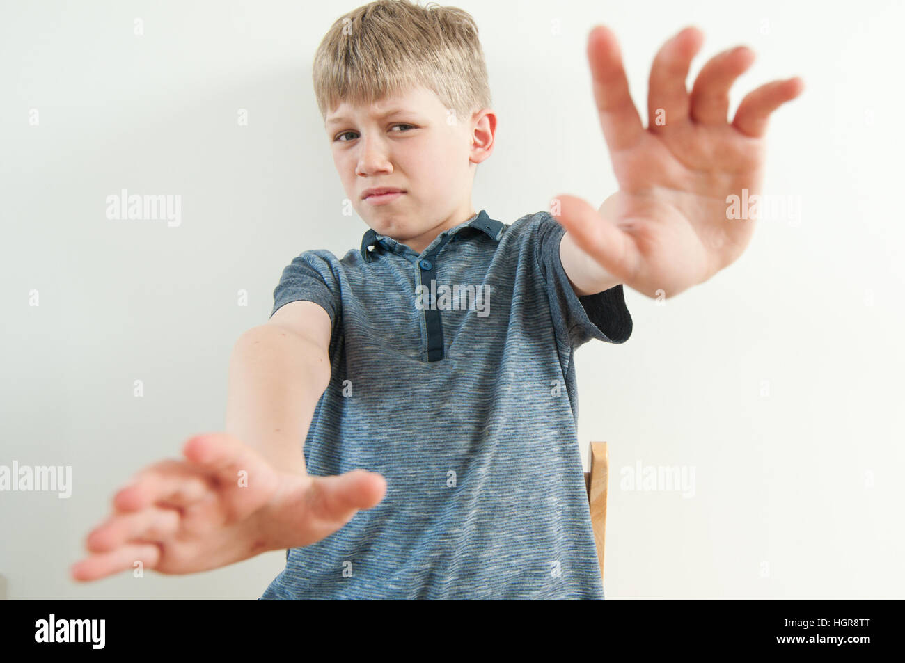 Point of view image of a young child scared from being attacked Stock Photo
