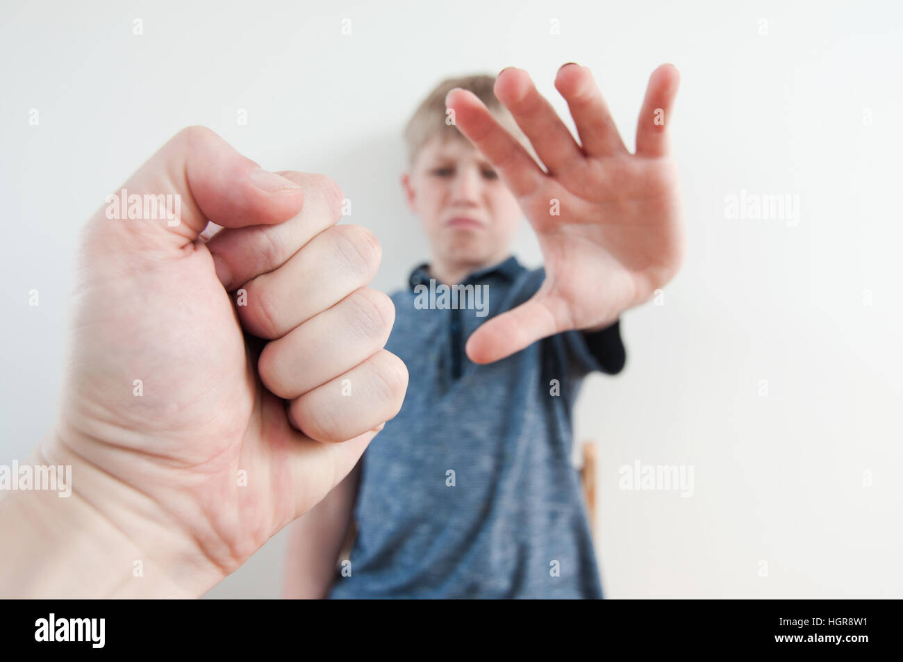 A POV image of a boy being threatened by an abusive parent Stock Photo