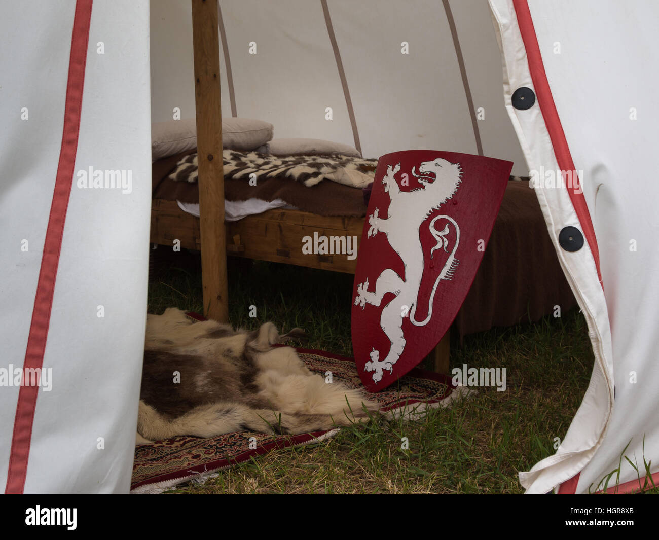 Inside Medieval Tent Wodden Bed, Carpet and Red Shield with Dragon