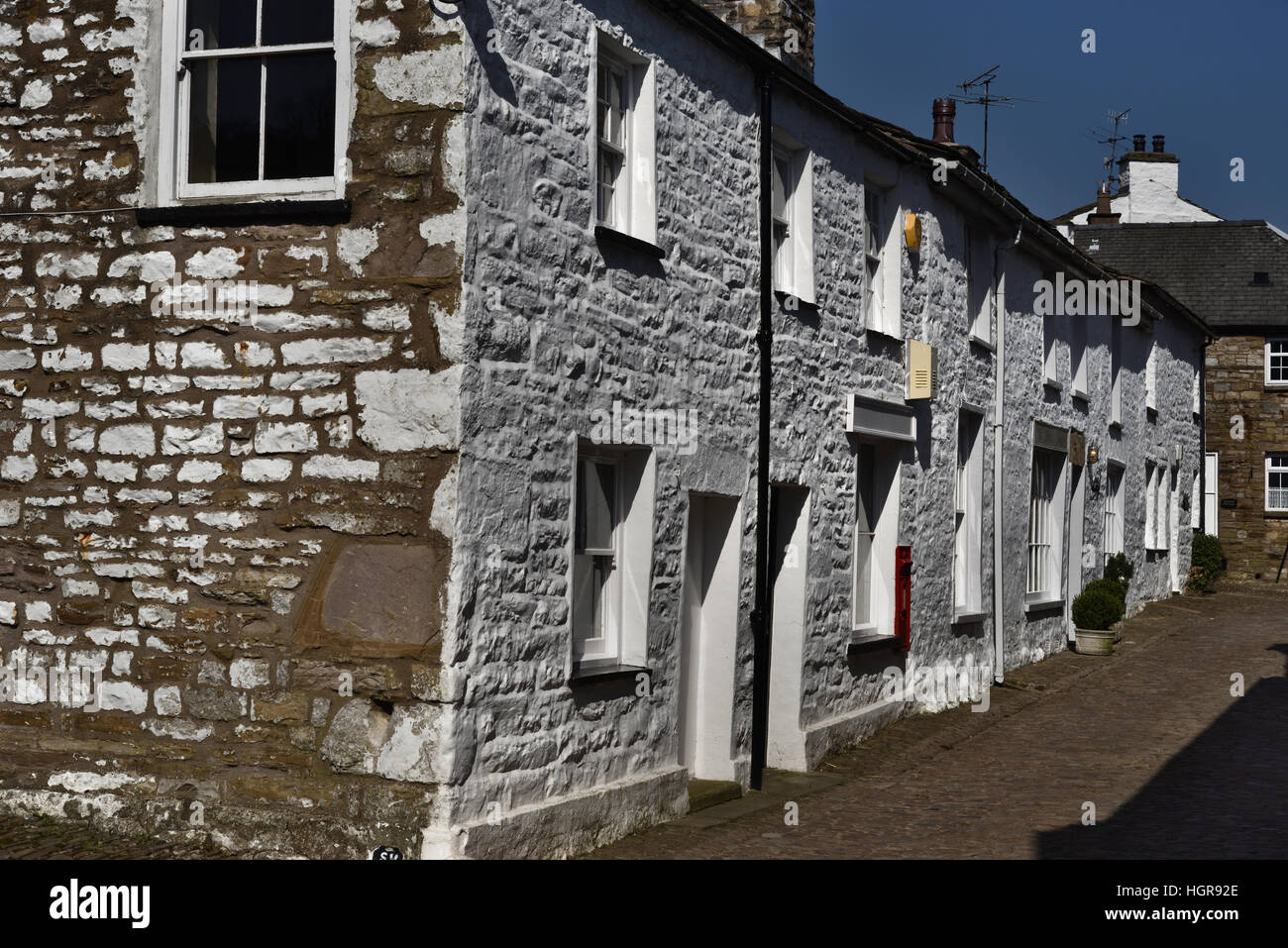 White cottages, cobbled Main Street, Dent village, Yorkshire Dales National Park, Cumbria, England,  UK. Stock Photo