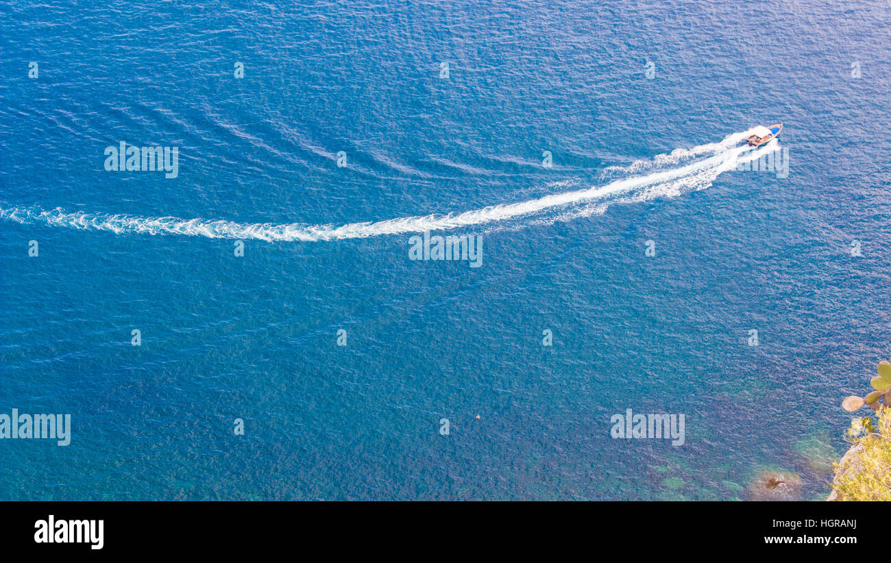 Speedboat cruising over the blue Mediterranean Sea Stock Photo - Alamy