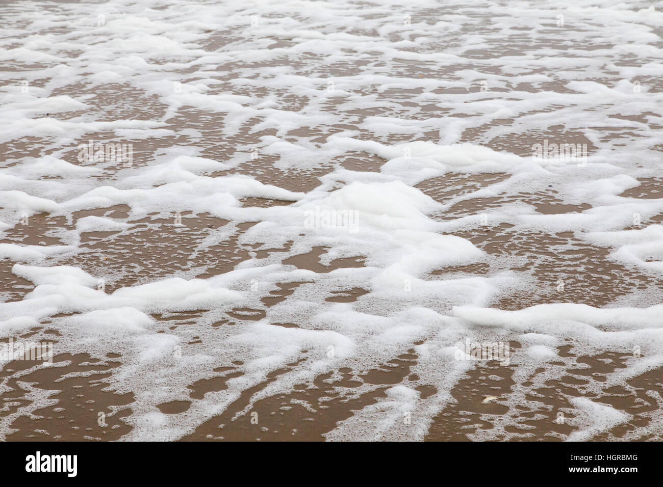Spume / sea foam / ocean foam / beach foam formed during stormy