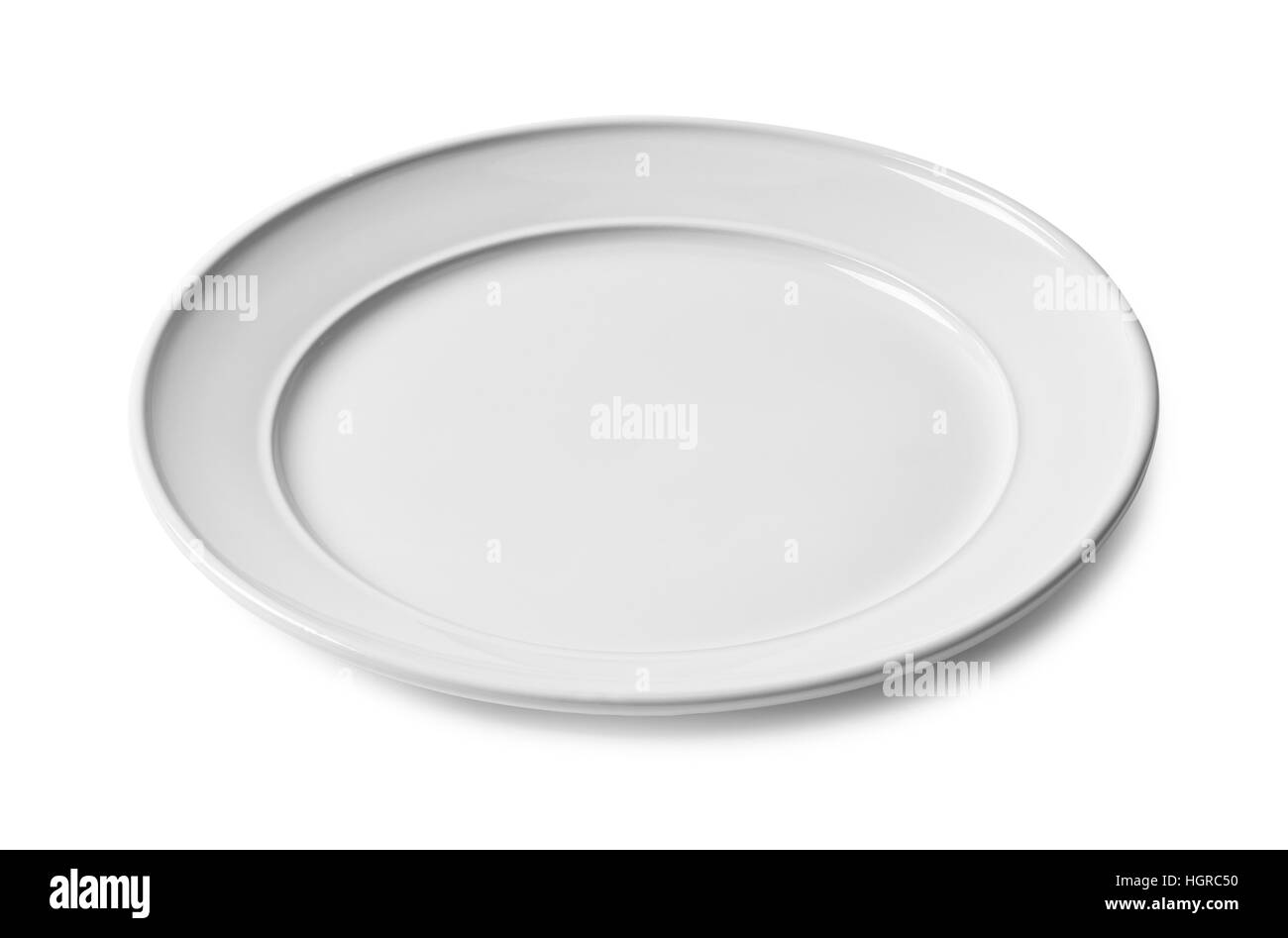 Empty White Ceramic Plate Isolated on White Background. Stock Photo