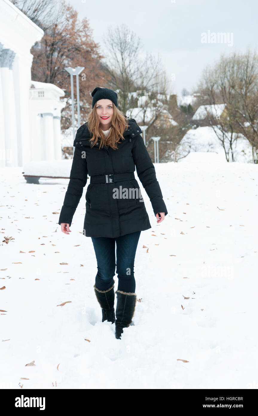 Woman walking outside winter hi-res stock photography and images - Alamy