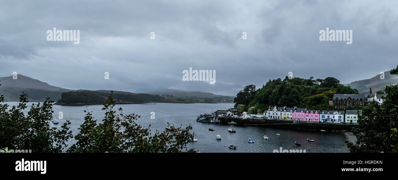 Beautiful Scottish panorama of the colorful waterfront properties at the harbor in Portree Isle of Skye Stock Photo