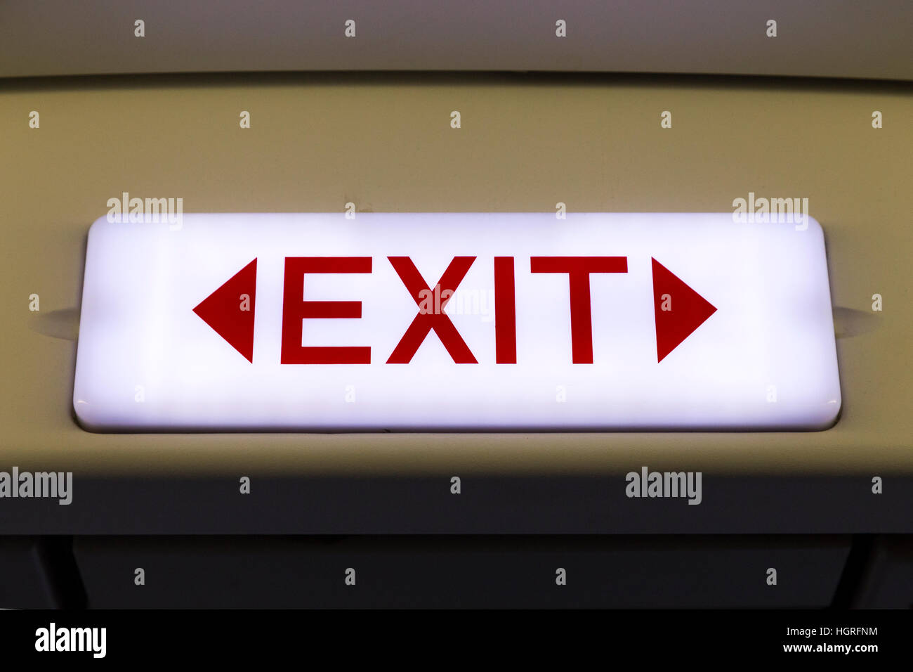 EXIT door sign on an Airbus A320 airplane Air plane aeroplane aircraft Stock Photo