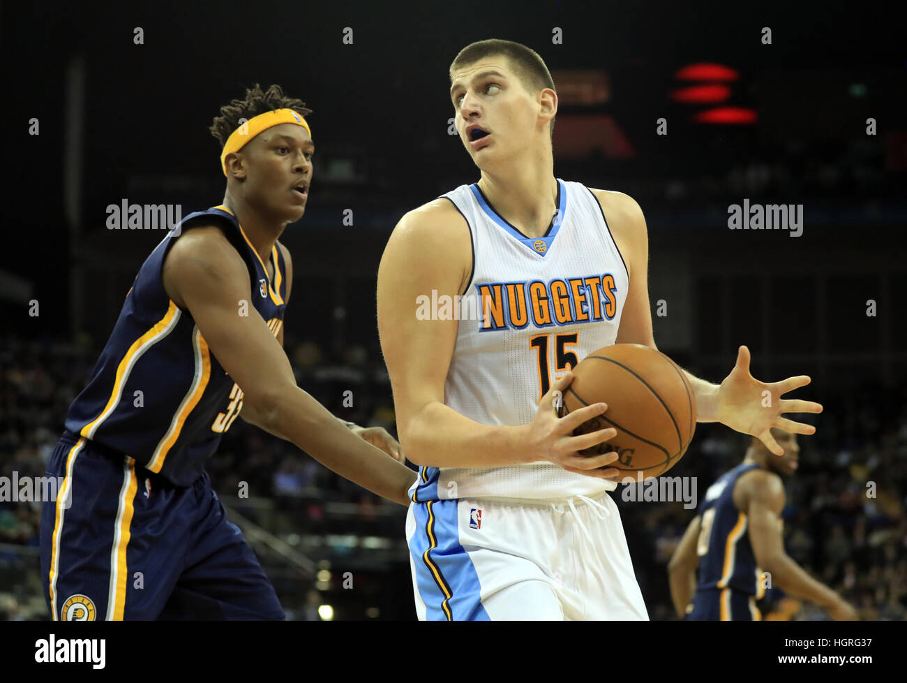 Denver Nuggets Nikola Jokic and Indiana Pacers Turner Myles (left) during the NBA Global game at the O2 Arena, London. Stock Photo