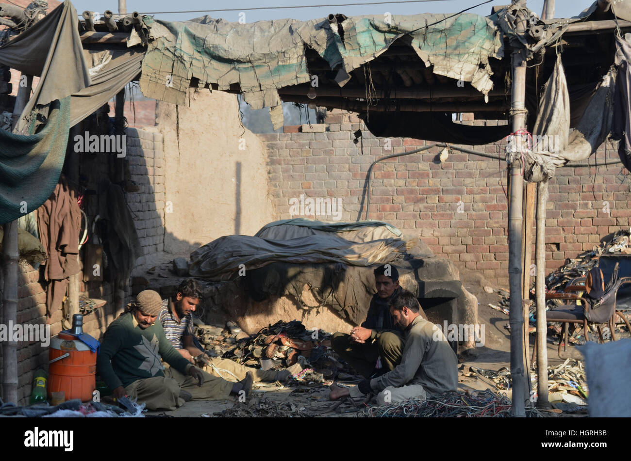 Lahore, Pakistan. 12th Jan, 2017. Pakistani people busy in their ...