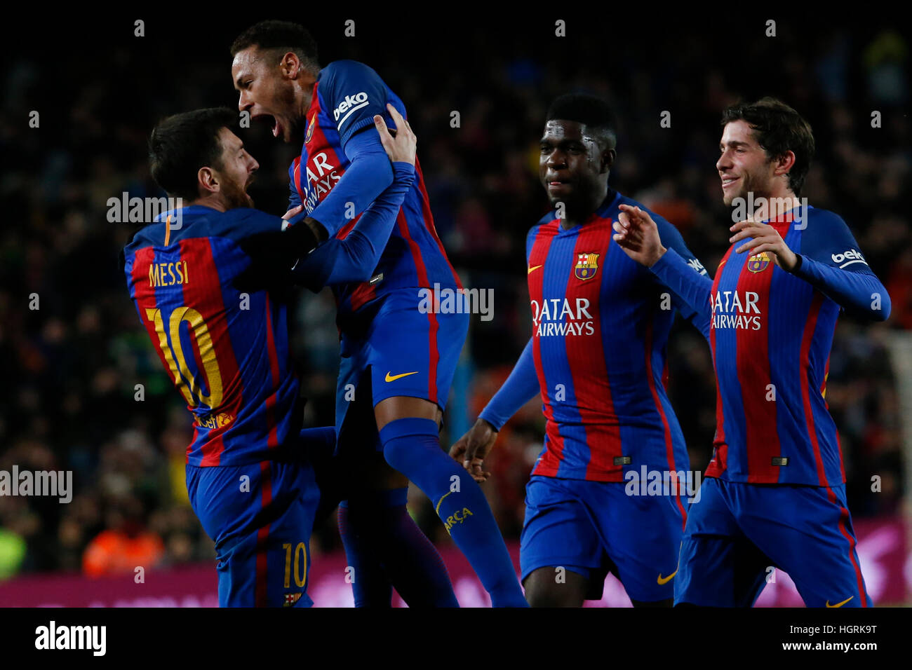 Barcelona, Spain. 11th Jan, 2017. Barcelona's Lionel Messi (1st L) celebrates after scoring with his teammate Neymar (2nd L) during the Spanish King's Cup soccer match FC Barcelona against Athletic de Bilbao at the Camp Nou Stadium in Barcelona, Spain, Jan. 11, 2017. Barcelona won 3-1. © Pau Barrena/Xinhua/Alamy Live News Stock Photo