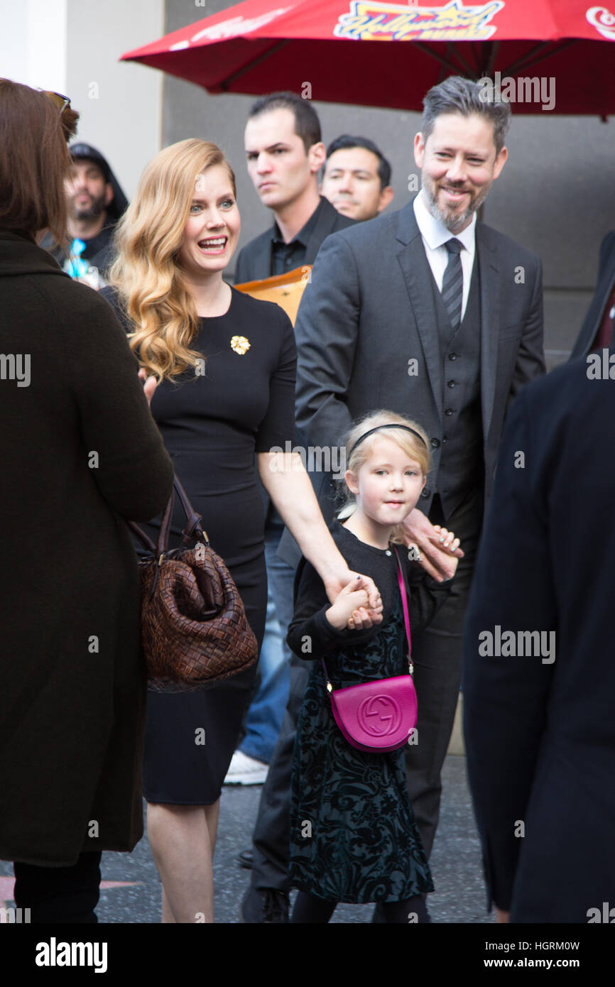 Hollywood, California, USA. 11th Jan, 2017.  Actress Amy Adams, her daughter Aviana de Gallo, and husband Darren de Gallo, arrive at the Hollywood Walk of Fame ceremony where Amy is being honored with a star on Hollywood Boulevard in Hollywood, California, USA. © Sheri Determan/Alamy Live News Stock Photo