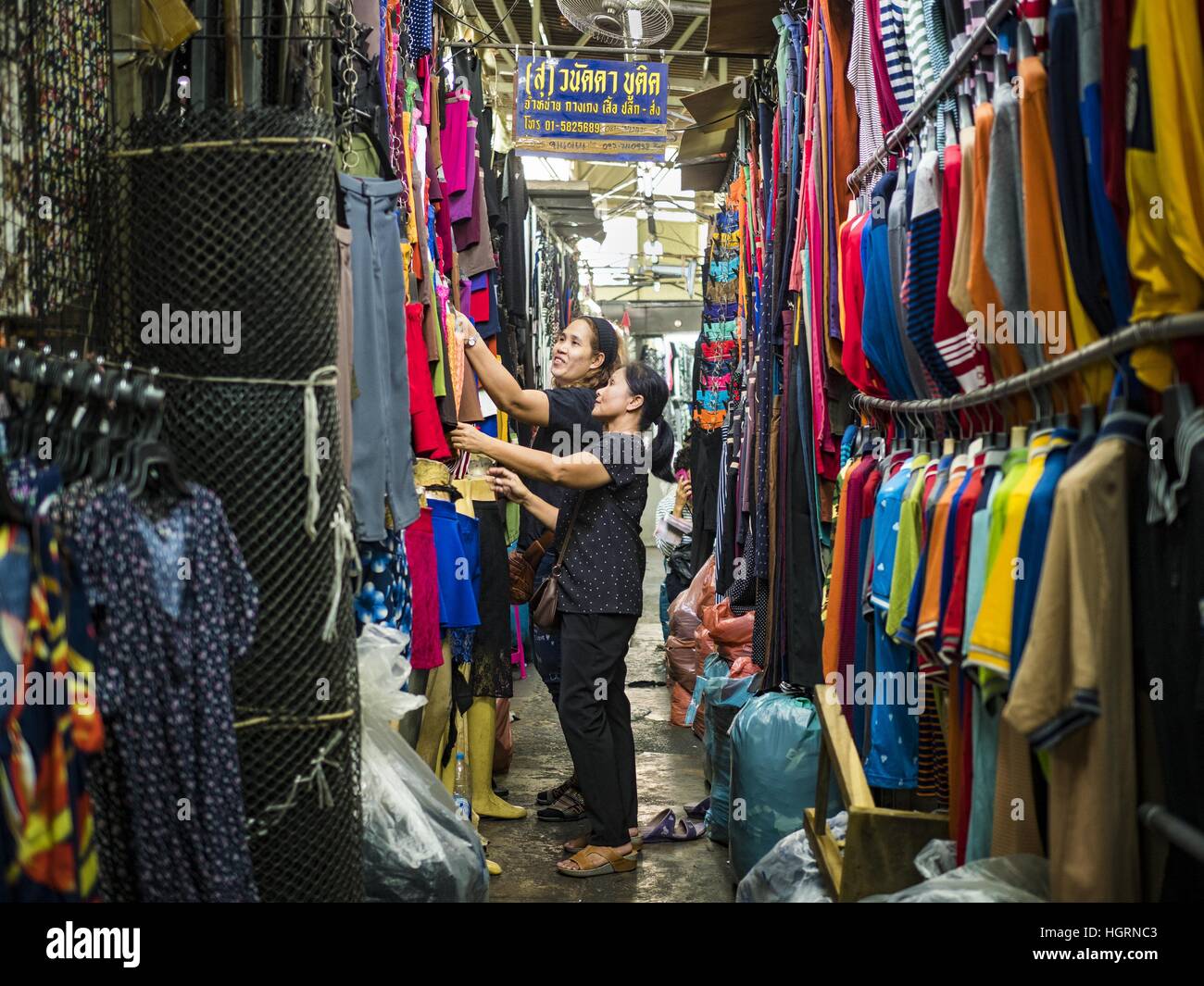 Bangkok, Bangkok, Thailand. 12th Jan, 2017. A woman shops for clothes in Bo Bae Market. Bo Bae Market is a sprawling wholesale clothing market in Bangkok. There are reportedly more than 1,200 stalls selling clothes made in Thailand and neighboring countries. Bangkok officials have threatened to shut down parts of Bo Bae market, but so far it has escaped the fate of the other street markets that have been shut down. © Jack Kurtz/ZUMA Wire/Alamy Live News Stock Photo