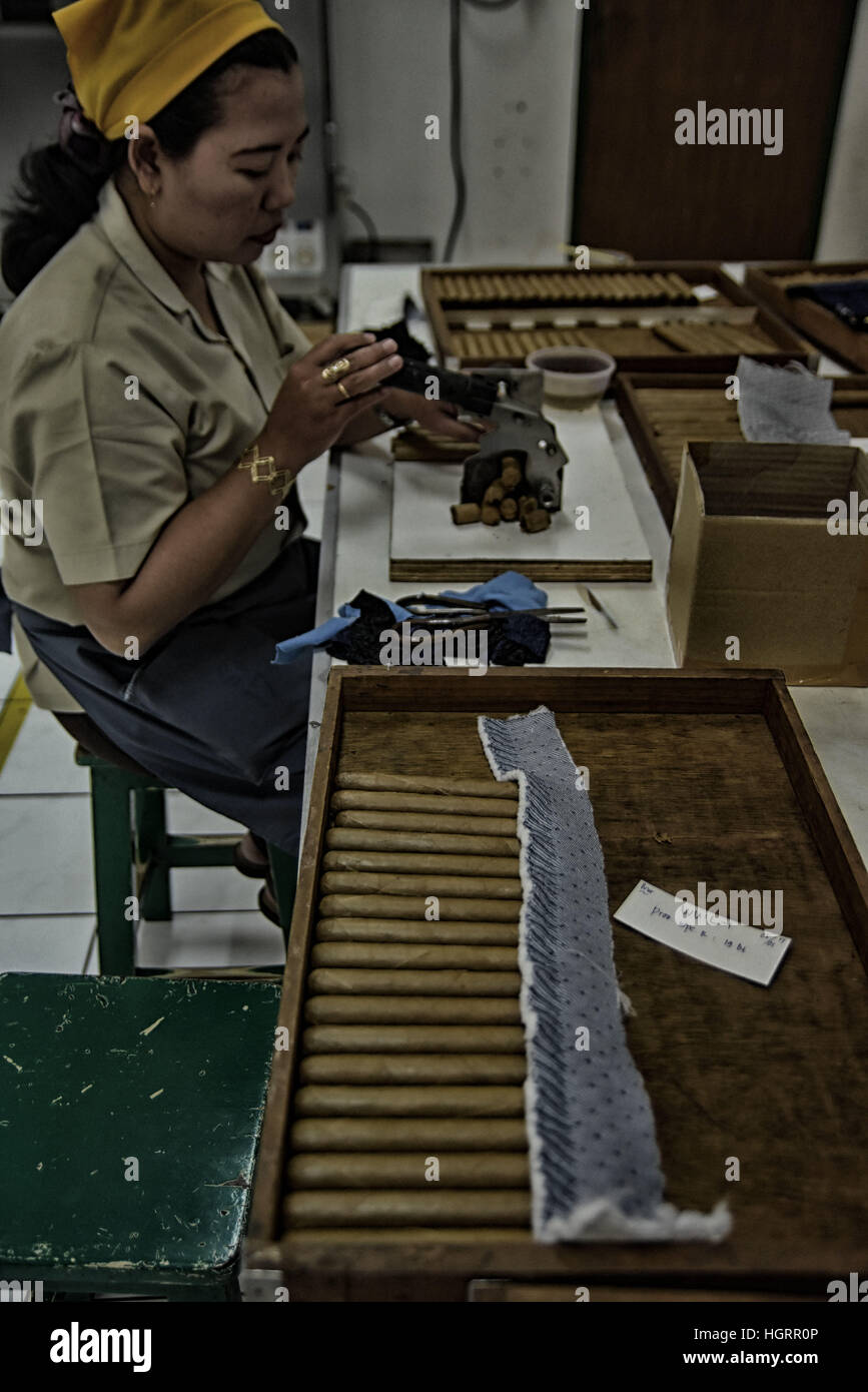 January 6, 2017 - Surabaya, East Java, Indonesia - EAST JAVA, INDONESIA - JANUARY 12 : Indonesian workers handrolling clove cigarettes at Cigarettes factory on January 06, 2017 in Surabaya, East Java, Indonesia. Indonesia is world largets cigarettes produce. (Credit Image: © Sijori Images via ZUMA Wire) Stock Photo