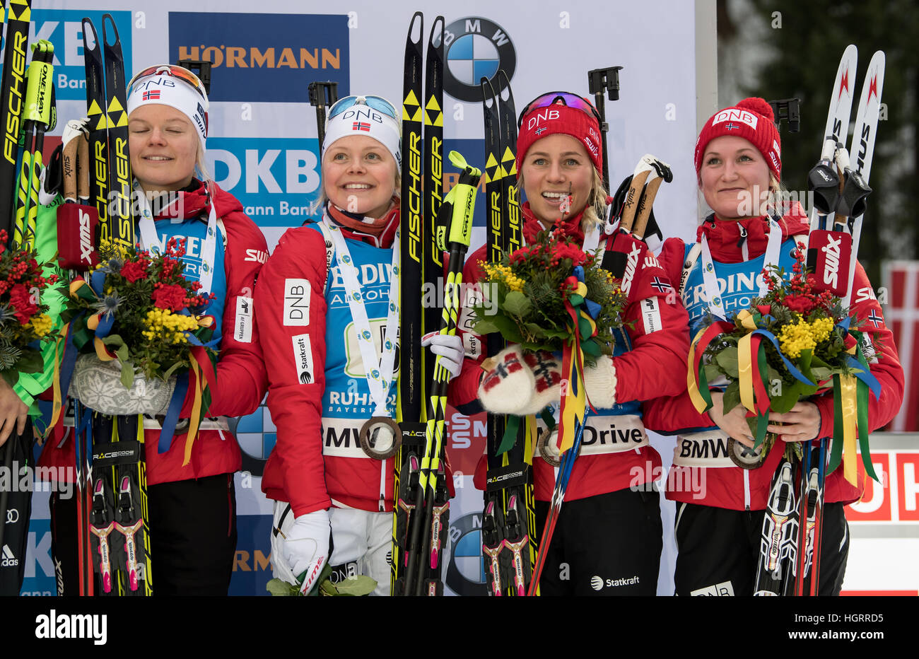 Ruhpolding, Germany. 12th Jan, 2017. L-R: Norwegian biathletes Kaia Woeien Nicolaisen, Hilde Fenne, Tiril Eckhoff and Marte Olsbu on the victors' podium after competing in the 4 x 6 kilometer women's relay race at the Biathlon World Cup in the Chiemgau Arena in Ruhpolding, Germany, 12 January 2017. Germany finished in first place ahead of France and Norway. Photo: Matthias Balk/dpa/Alamy Live News Stock Photo