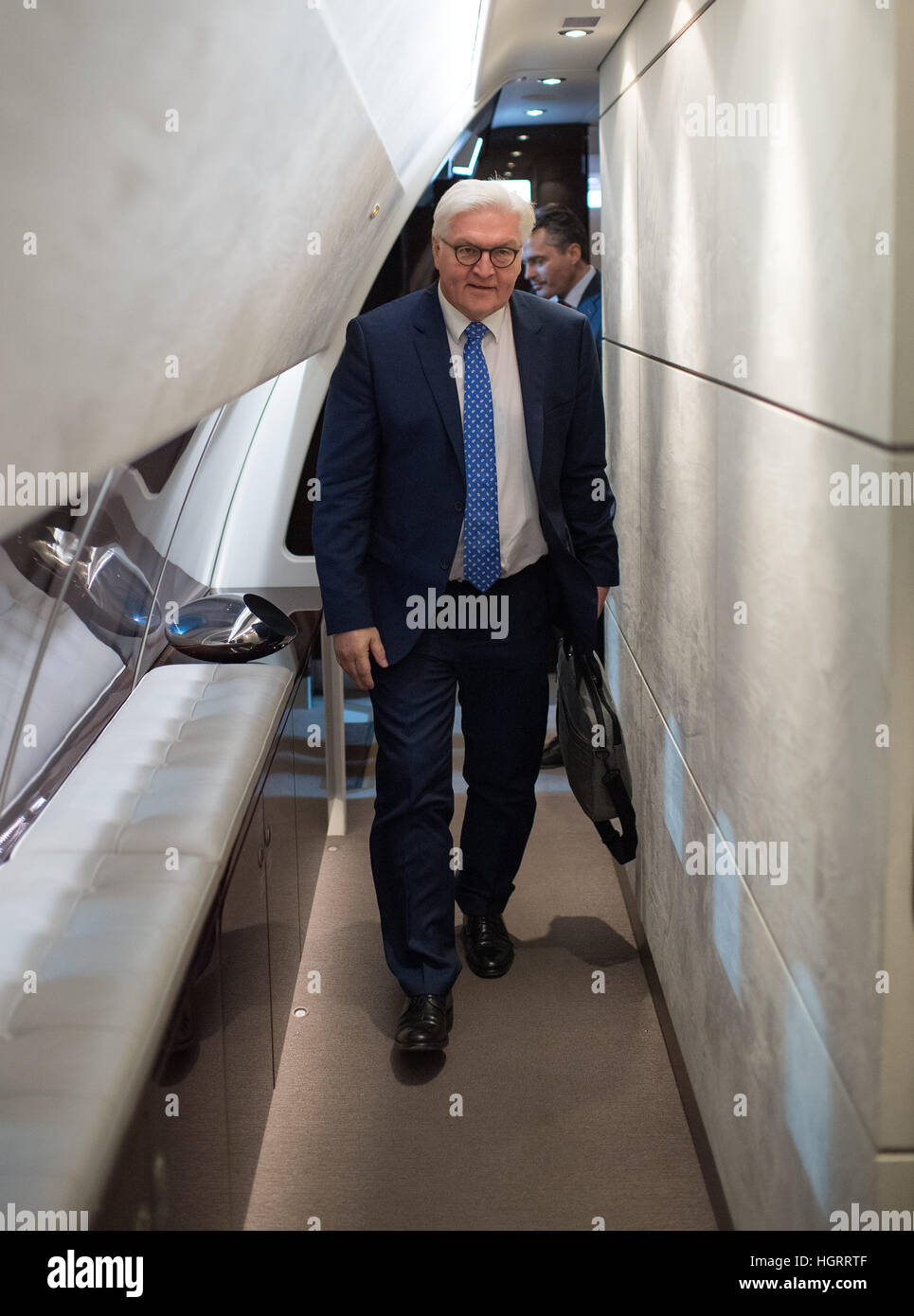 Berlin, Germany. 12th Jan, 2017. The German Foreign Minister Frank-Walter Steinmeier (SPD) in the military part of Tegel Airport in Berlin, Germany, 12 January 2017. The minister was boarding an official government plane bound for Columbia where he will spend one day in Bogata for the purpose of bilateral talks as well as visiting one of the zones in which guerilla fighters associated with the leftwing rebel group FARC have agreed to lay down their arms. Photo: Bernd von Jutrczenka/dpa/Alamy Live News Stock Photo