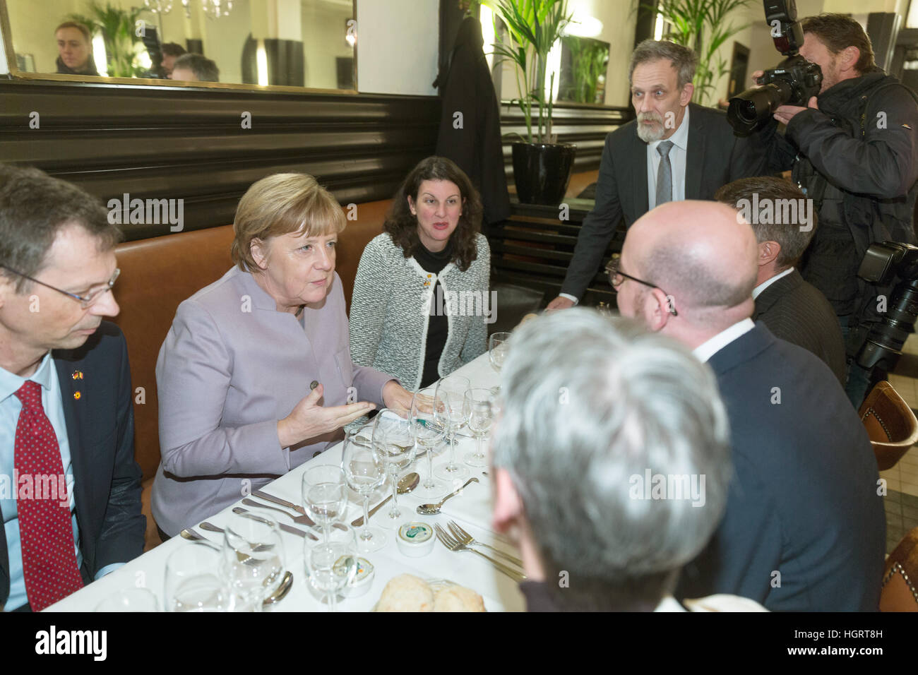 Brussels, Belgium. 12th Jan, 2017. The German Chancellor Angela Merkel (CDU) with the Belgian Prime Minister Charles Michel (R) in the Taverne du Passage in Brussels, Belgium, 12 January 2017. Photo: Thierry Monasse/dpa/Alamy Live News Stock Photo