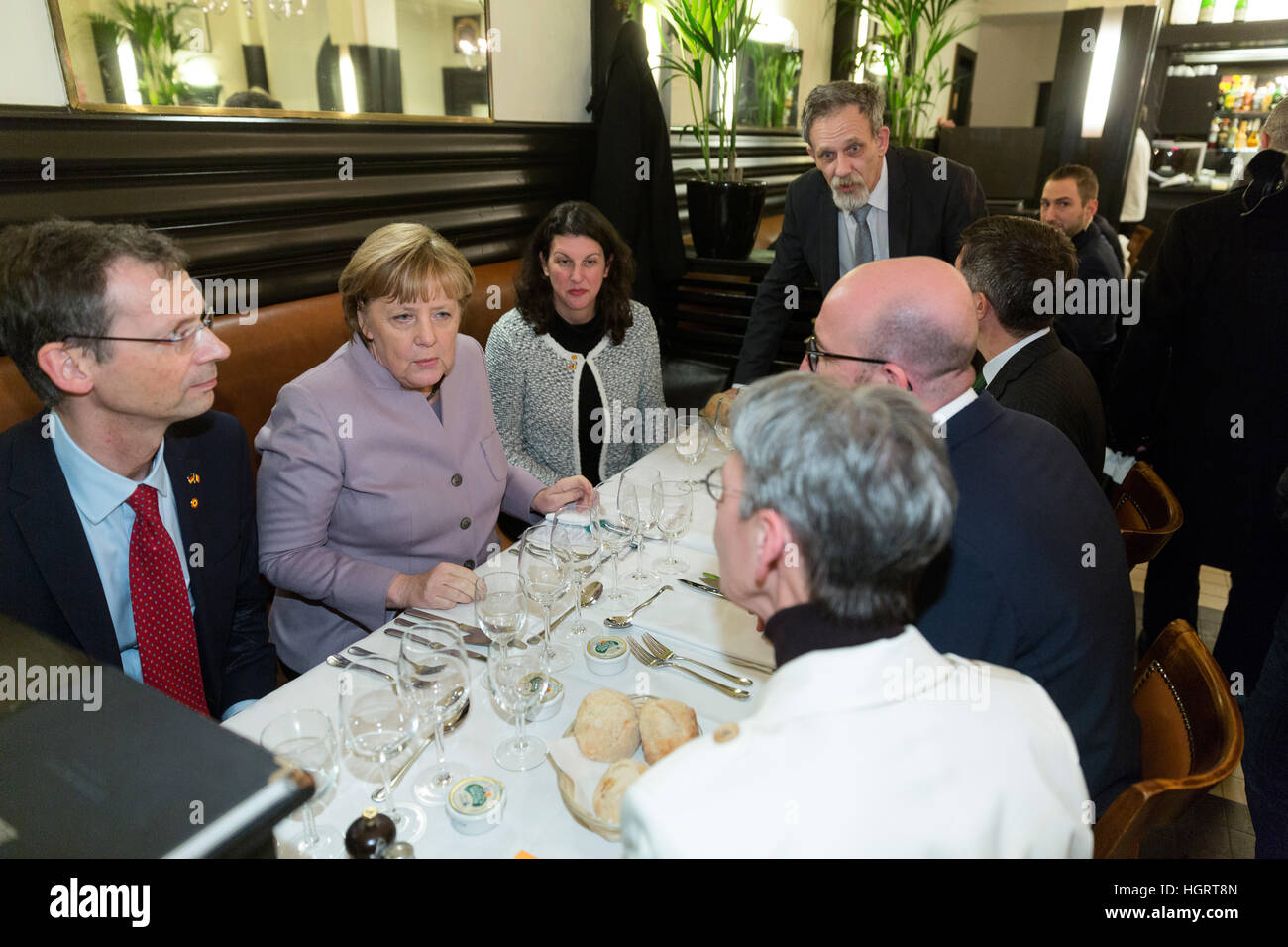 Brussels, Belgium. 12th Jan, 2017. The German Chancellor Angela Merkel (CDU) with the Belgian Prime Minister Charles Michel (R) in the Taverne du Passage in Brussels, Belgium, 12 January 2017. Photo: Thierry Monasse/dpa/Alamy Live News Stock Photo