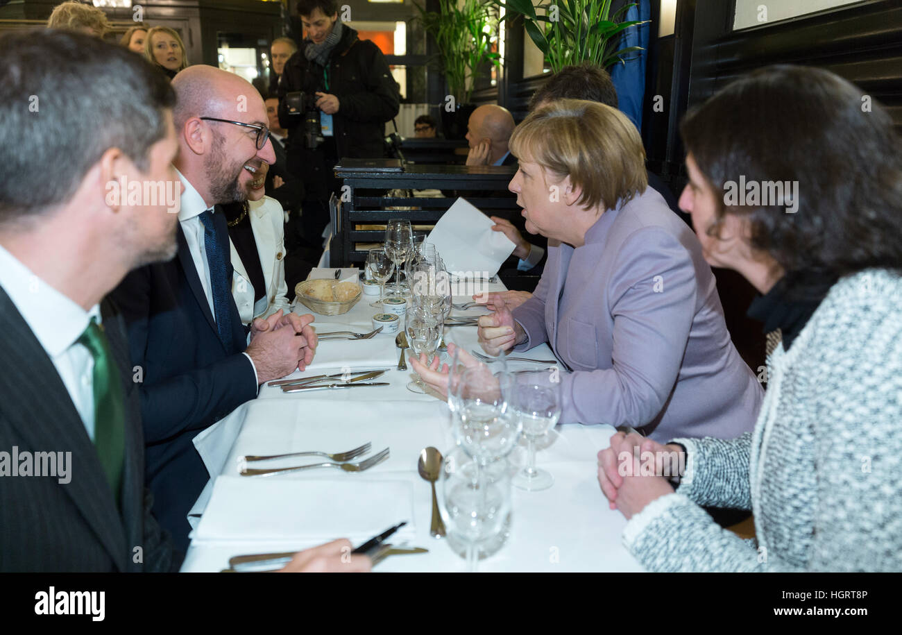 Brussels, Belgium. 12th Jan, 2017. The German Chancellor Angela Merkel (CDU) with the Belgian Prime Minister Charles Michel (R) in the Taverne du Passage in Brussels, Belgium, 12 January 2017. Photo: Thierry Monasse/dpa/Alamy Live News Stock Photo