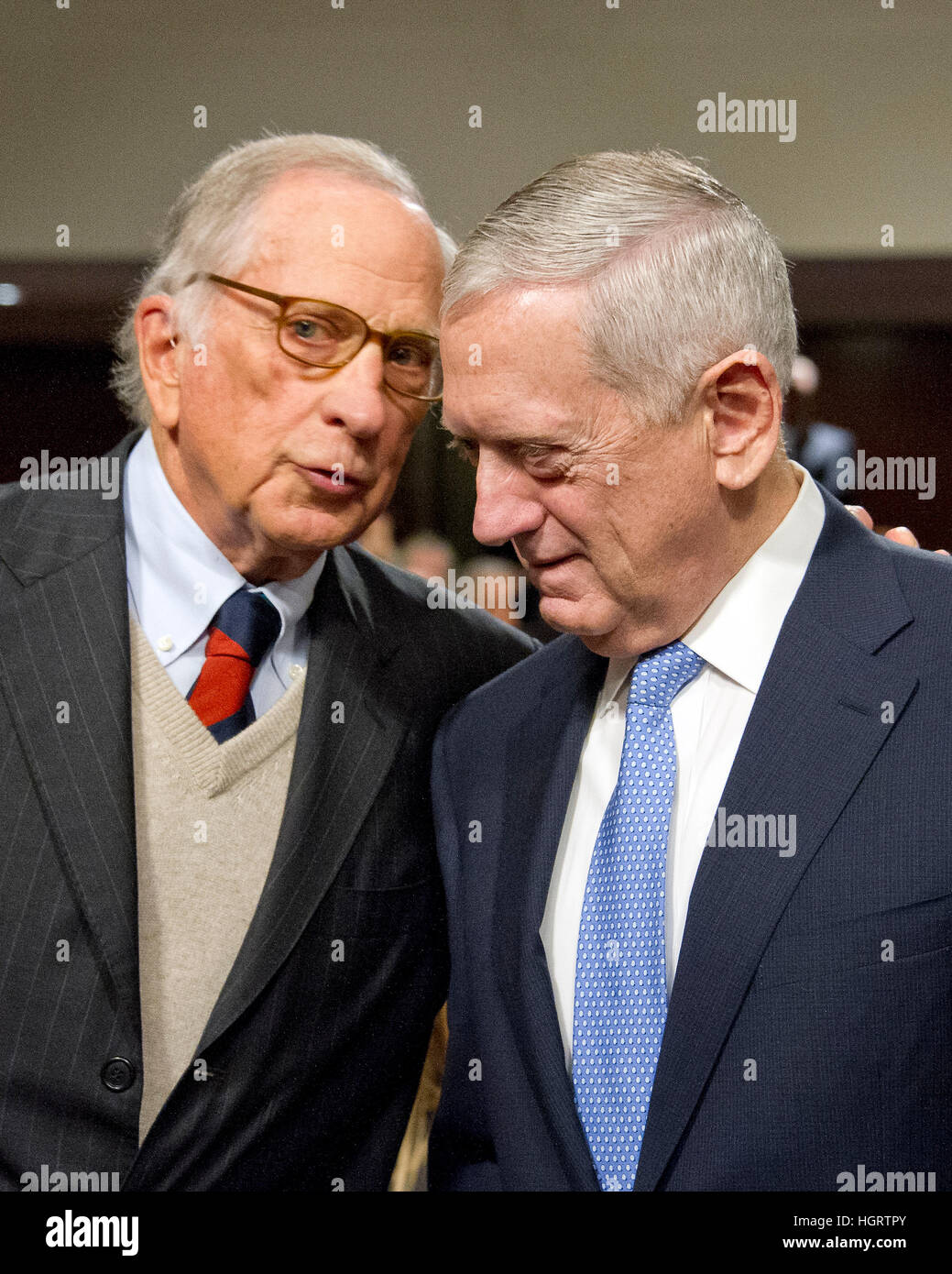 Washington DC, USA. 12th January 2017. Former United States Senator Sam Nunn (Democrat of Georgia), left, and US Marine Corps General James N. Mattis (retired), right, share a thought prior to the US Senate Committee on Armed Services confirmation hearing on Mattis' nomination to be US Secretary of Defense on Capitol Hill in Washington, DC on Thursday, January 12, 2017. Dunn, who served as Chairman of the US Senate Armed Services Committee from 1987 until 1995, introduced and endorsed Mattis. Credit: MediaPunch Inc/Alamy Live News Stock Photo