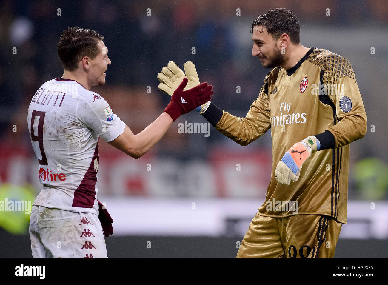 Milan, Italy. 12 Jan, 2017. Andrea Belotti (left) of Torino FC and  Gianluigi Donnarumma of AC Milan hug at the end of the Tim Cup football  match between AC Milan and Torino