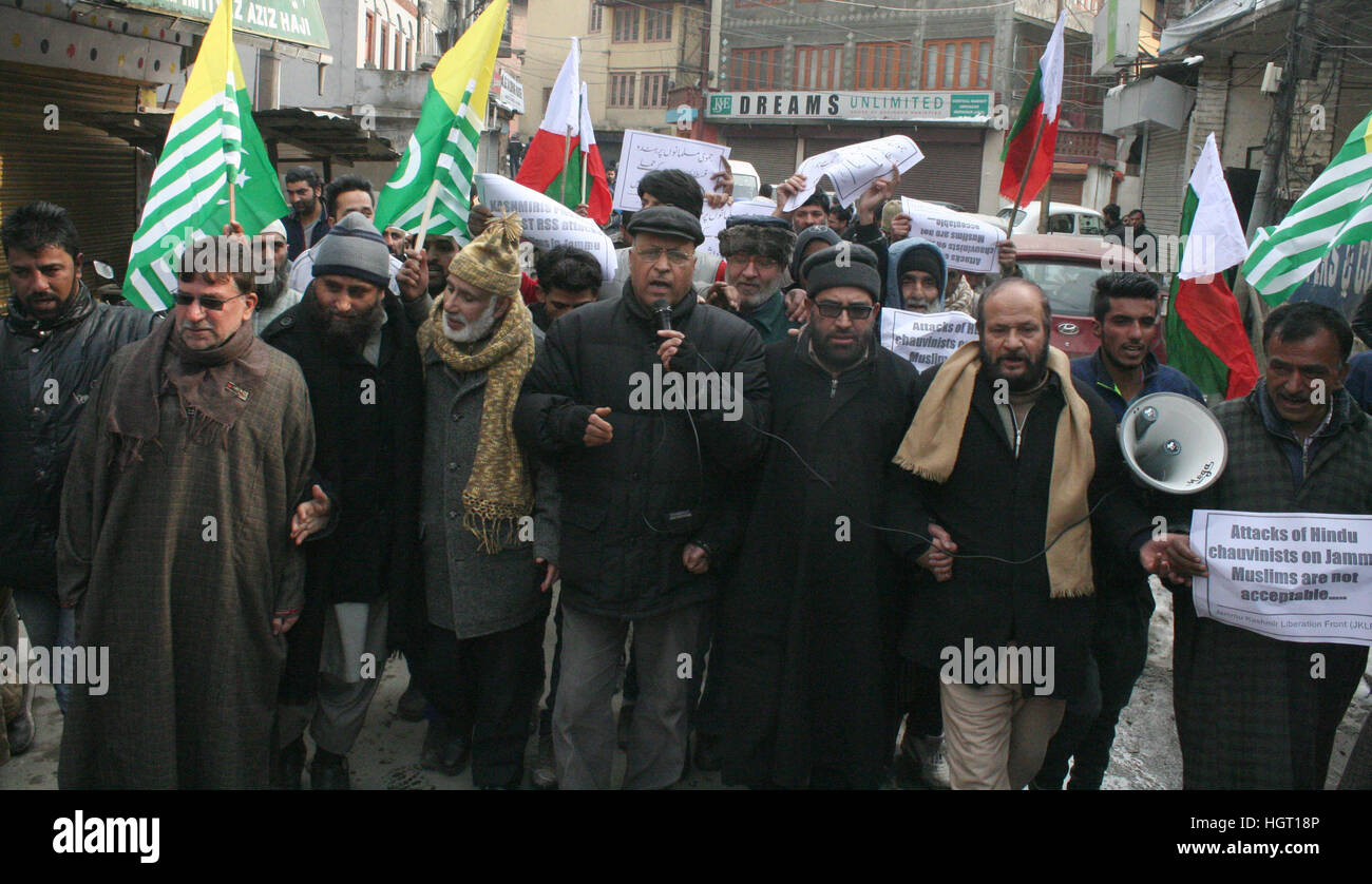Srinagar, Kashmir. 13th January, 2017. Activist of Jammu and Kashmir Lineration Front ( JKLF) take out rall after friday prayers against, attacks on Muslims in Kathua by RSS and their goons who enjoy complete immunity and openly brandish their weapons to scare members of Muslim community.on the appeal of Joint Resistance Leadership people protested in large numbers outside Jamia Masjid and other parts of vally Muslims in Kathua and demanded immediate action against the culprits. © Sofi Suhail/Alamy Live News Stock Photo