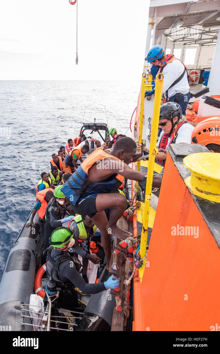 Refugees, who got rescued from distress at sea in international waters ...