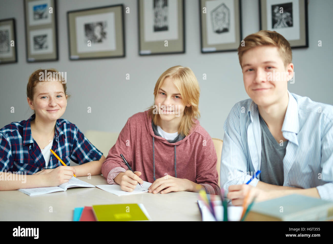 Group of youthful students sitting at lesson Stock Photo - Alamy