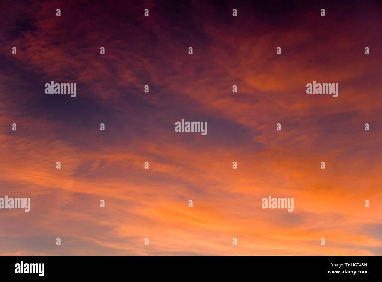 Dawn sky with red clouds Stock Photo - Alamy