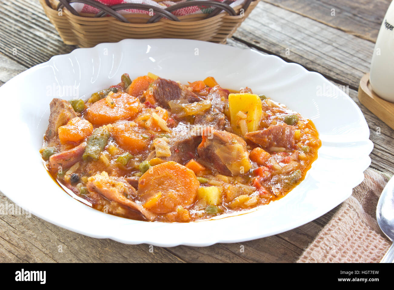Pork meat stew with vegetables in plate Stock Photo