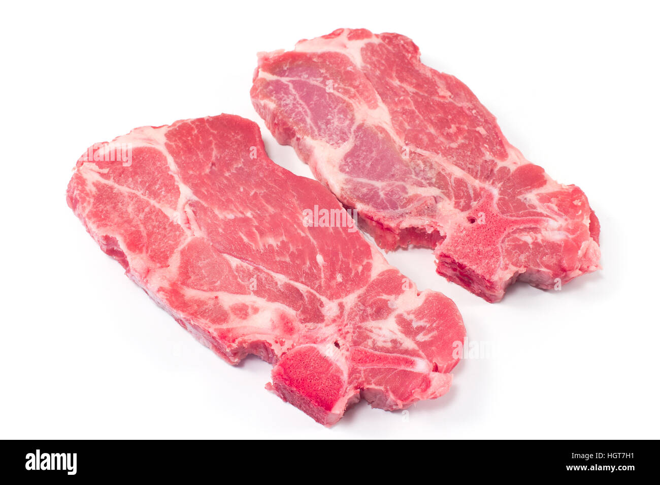 Pork neck chop meat isolated on white Stock Photo