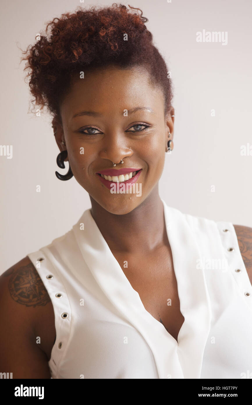 Beautiful young african woman hi-res stock photography and images - Alamy