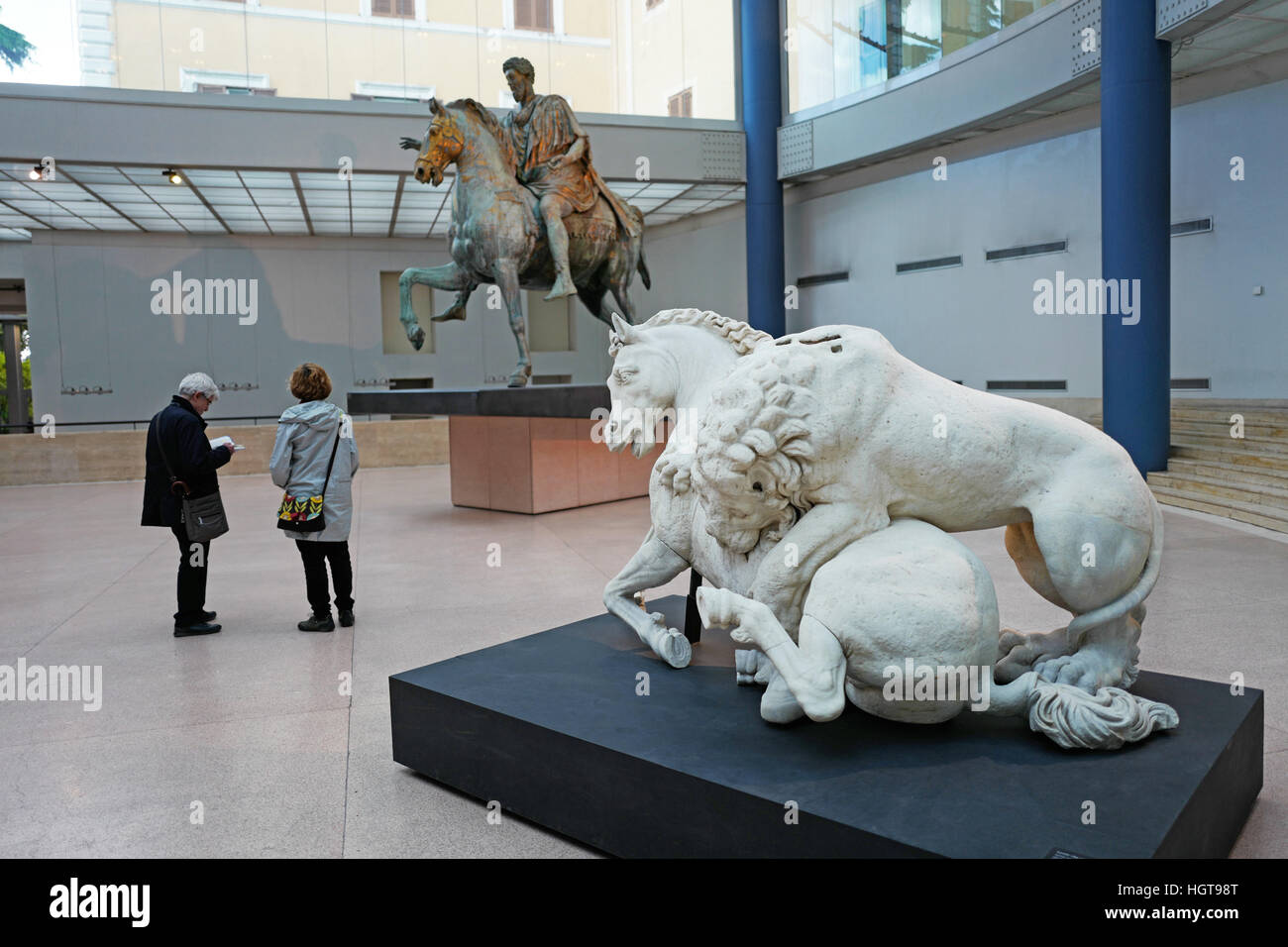 Roman bronze statue of Marcus Aurelius and lion attacking a horse displayed in the Capitoline Museums in Rome Stock Photo