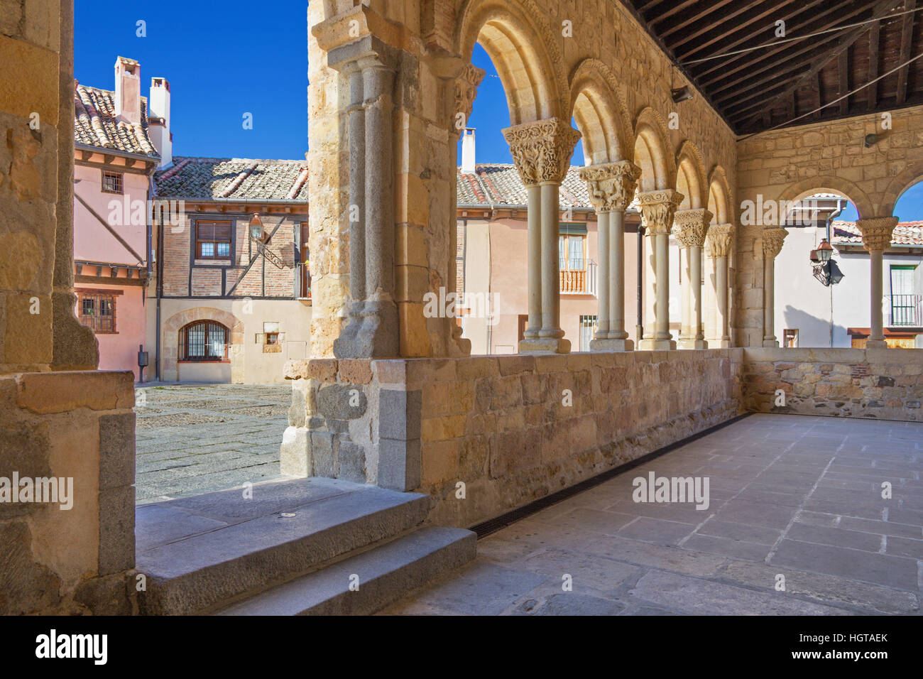 Segovia - The portico of Romanesque church Iglesia de San Lorenzo and the square with the same name. Stock Photo