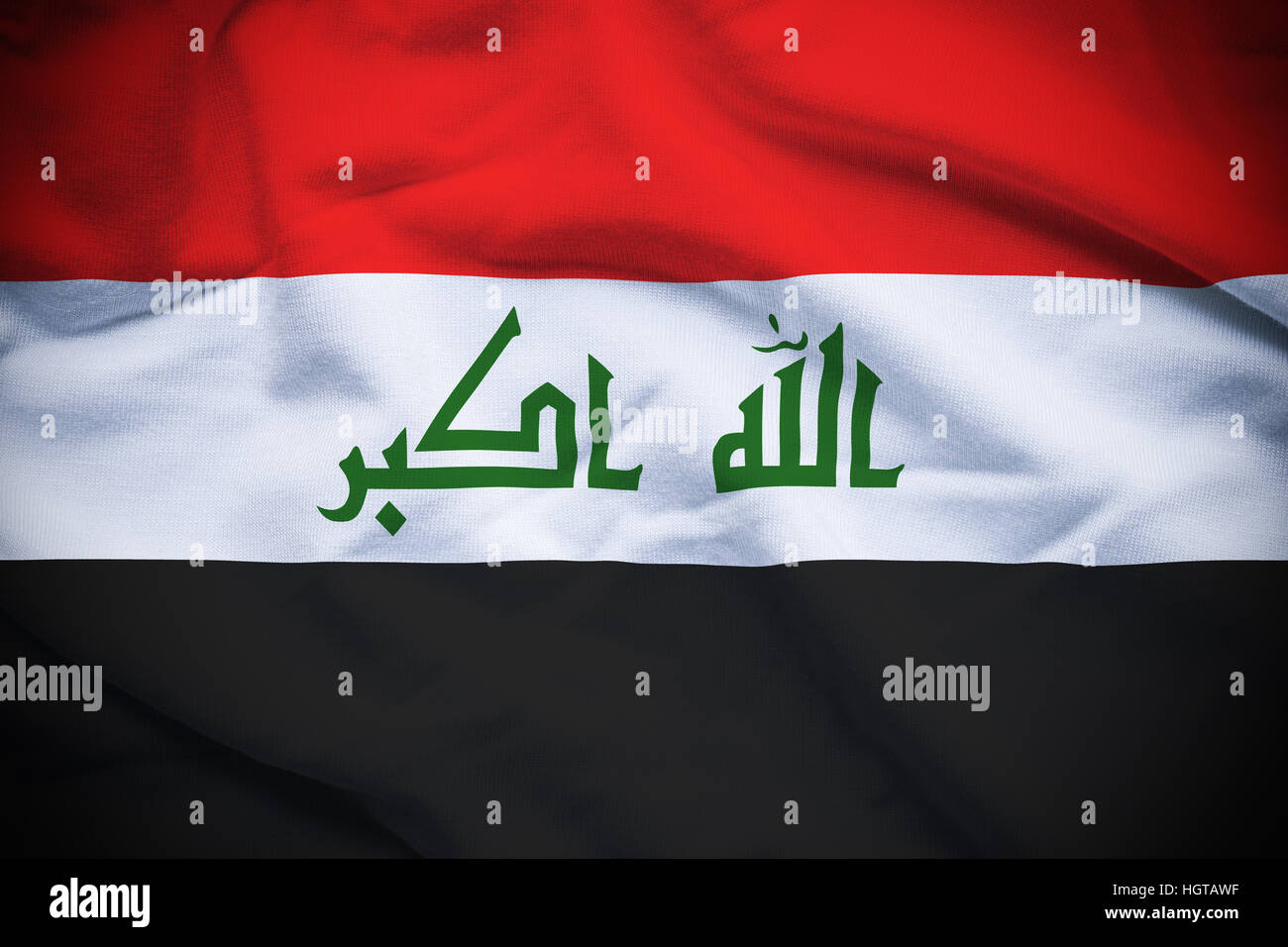 Wavy and rippled national flag of Iraq background. Stock Photo
