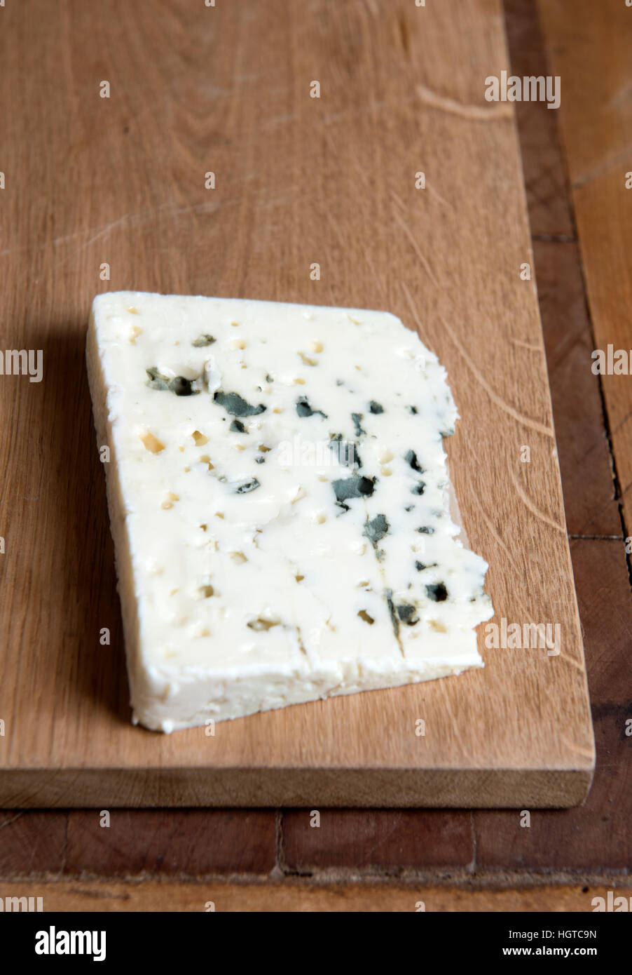 A wedge of French Blue cheese Stock Photo