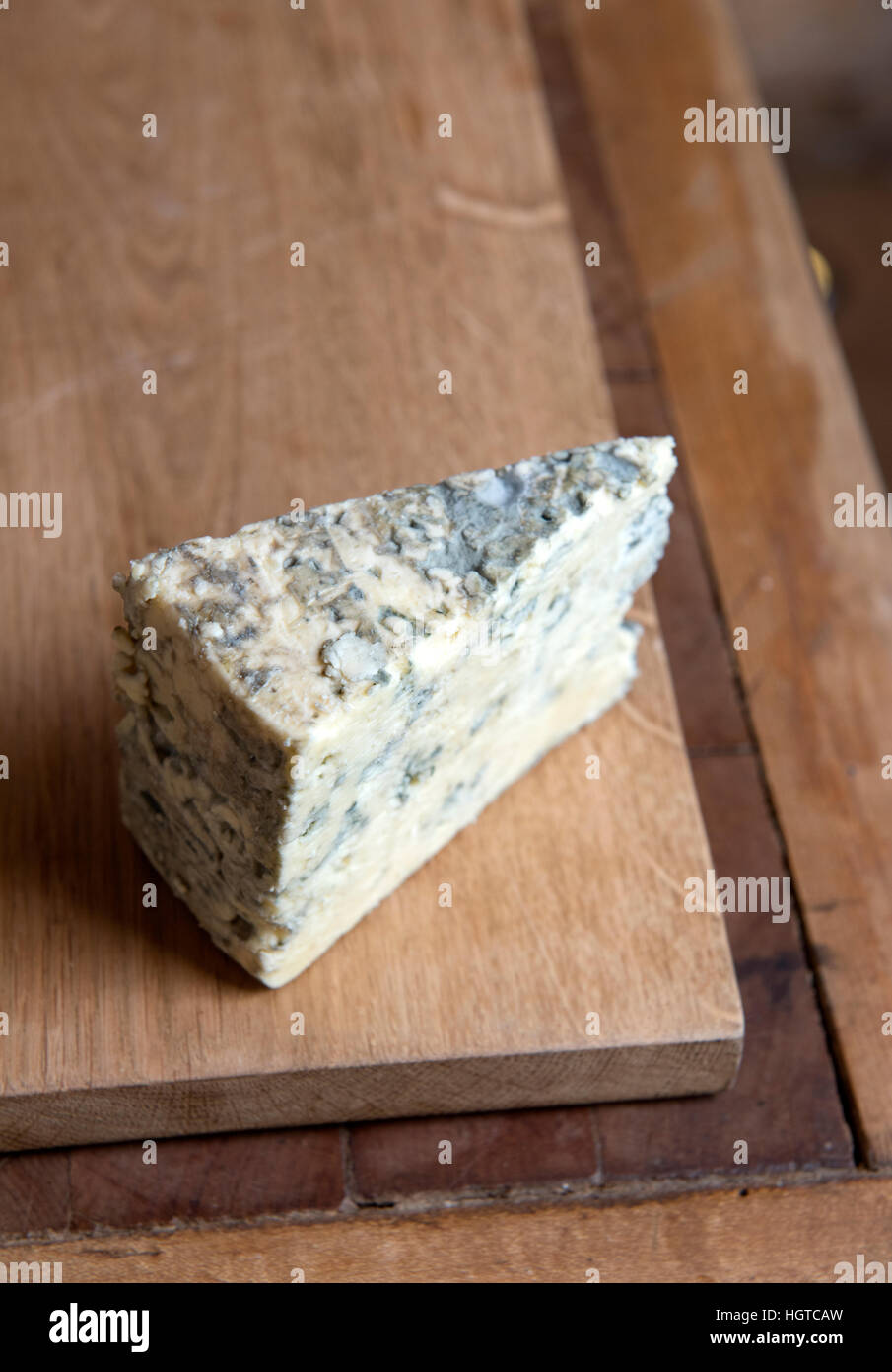 A wedge of English Blue cheese Stock Photo