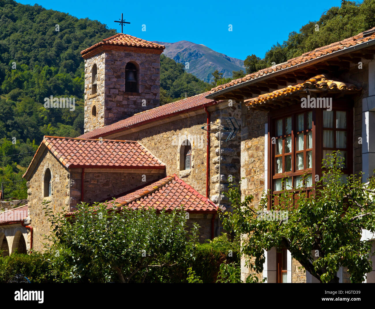 Traditional stone church in the village of Vega de Liebana in the Picos de Europa National Park in Cantabria northern Spain Stock Photo
