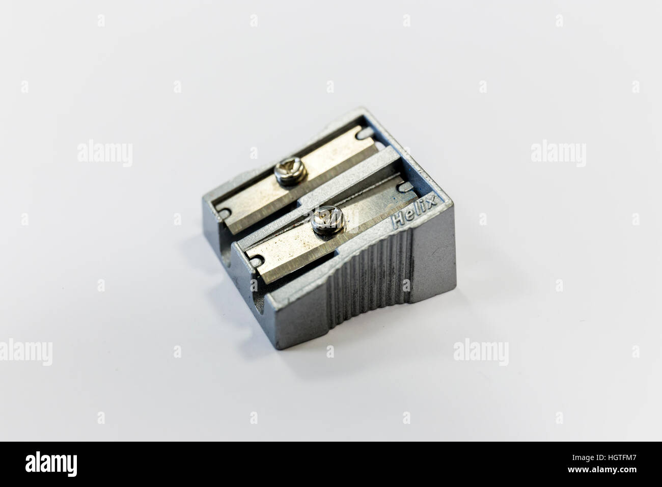 twin blade metal pencil sharpener on white backgroundgp Stock Photo Alamy