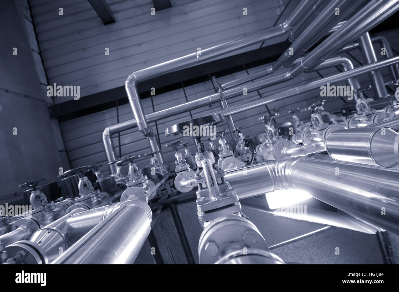 Industry oil and gas pipes, concept of industry systems, steel pipelines , blue toned Stock Photo