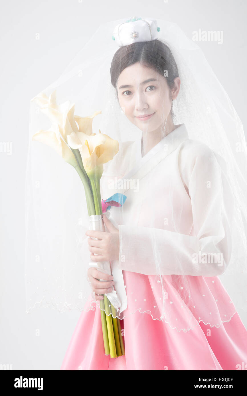 Young smiling bride in traditional Korean clothes Stock Photo Alamy