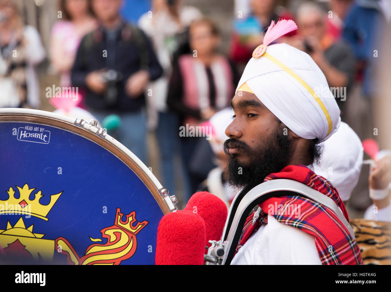 Drummer from the Sri Dasmesh Pipe Band of  Malaysian performing in Glasgow. Stock Photo