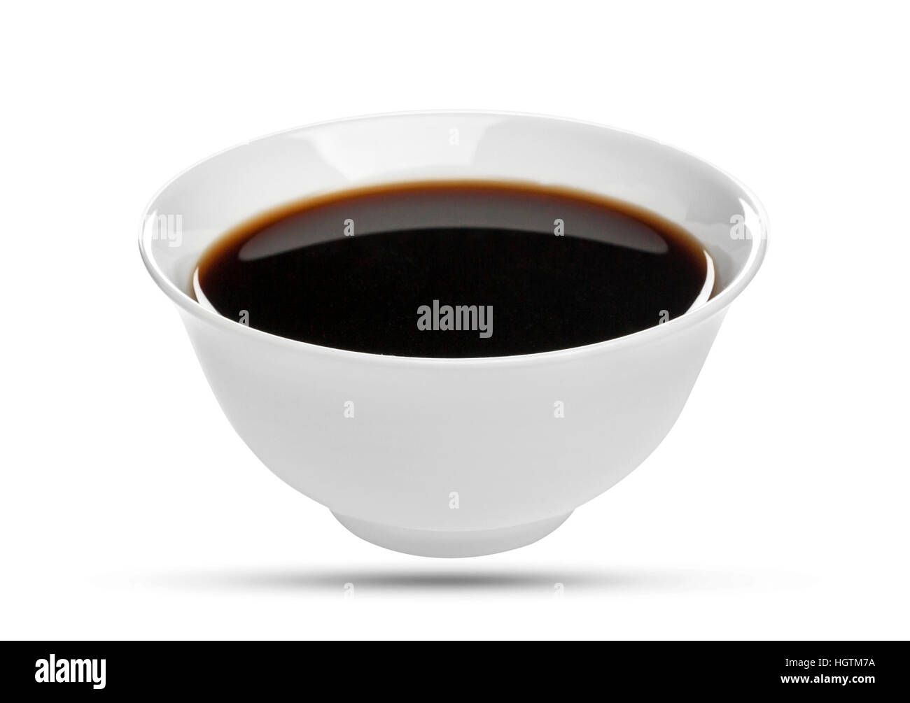 Soy sauce in bowl isolated on white background, with clipping path