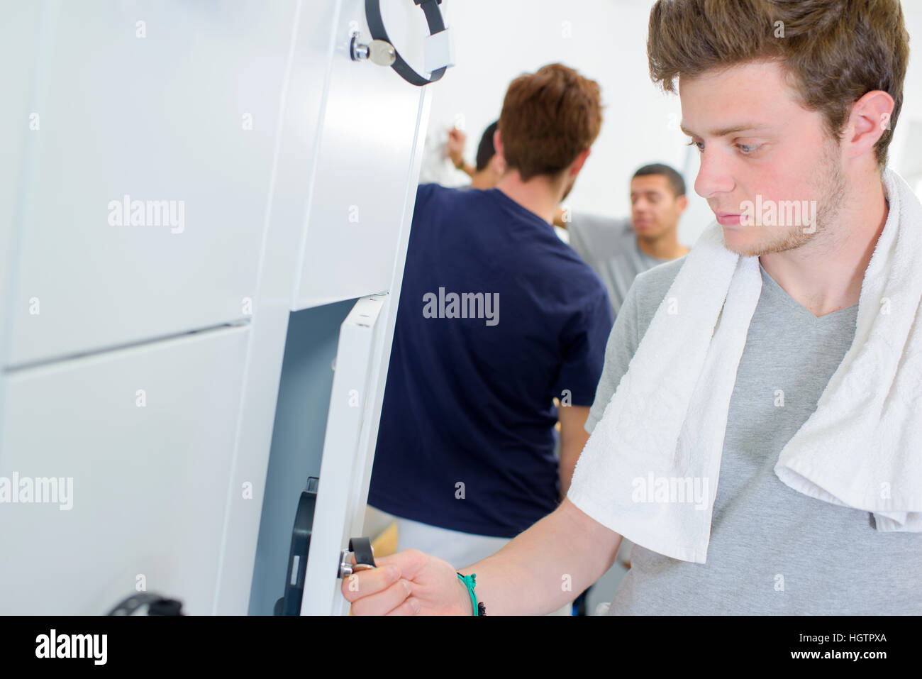 Man in locker room Stock Photo