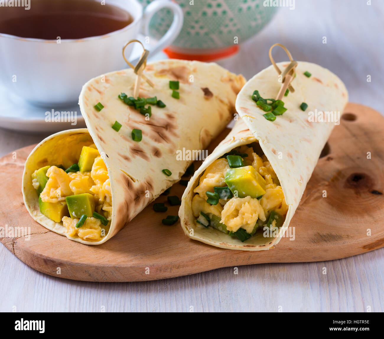 homemade-avocado-scrambled-egg-wraps-for-healthy-breakfast-stock-photo
