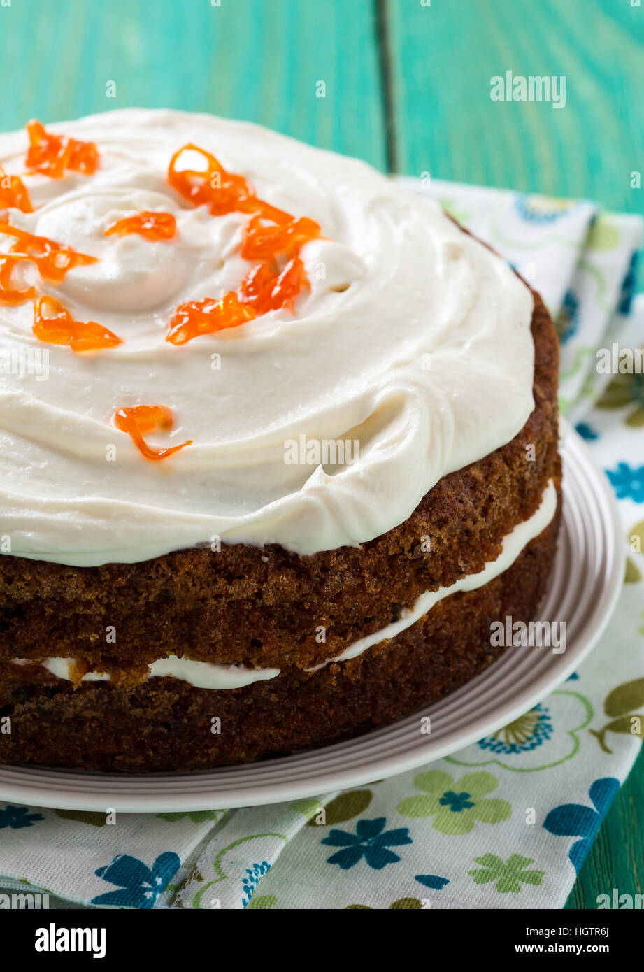 Mother's day carrot cake, homemade sweet layer cake with carrot,  walnuts and dried apricot Stock Photo