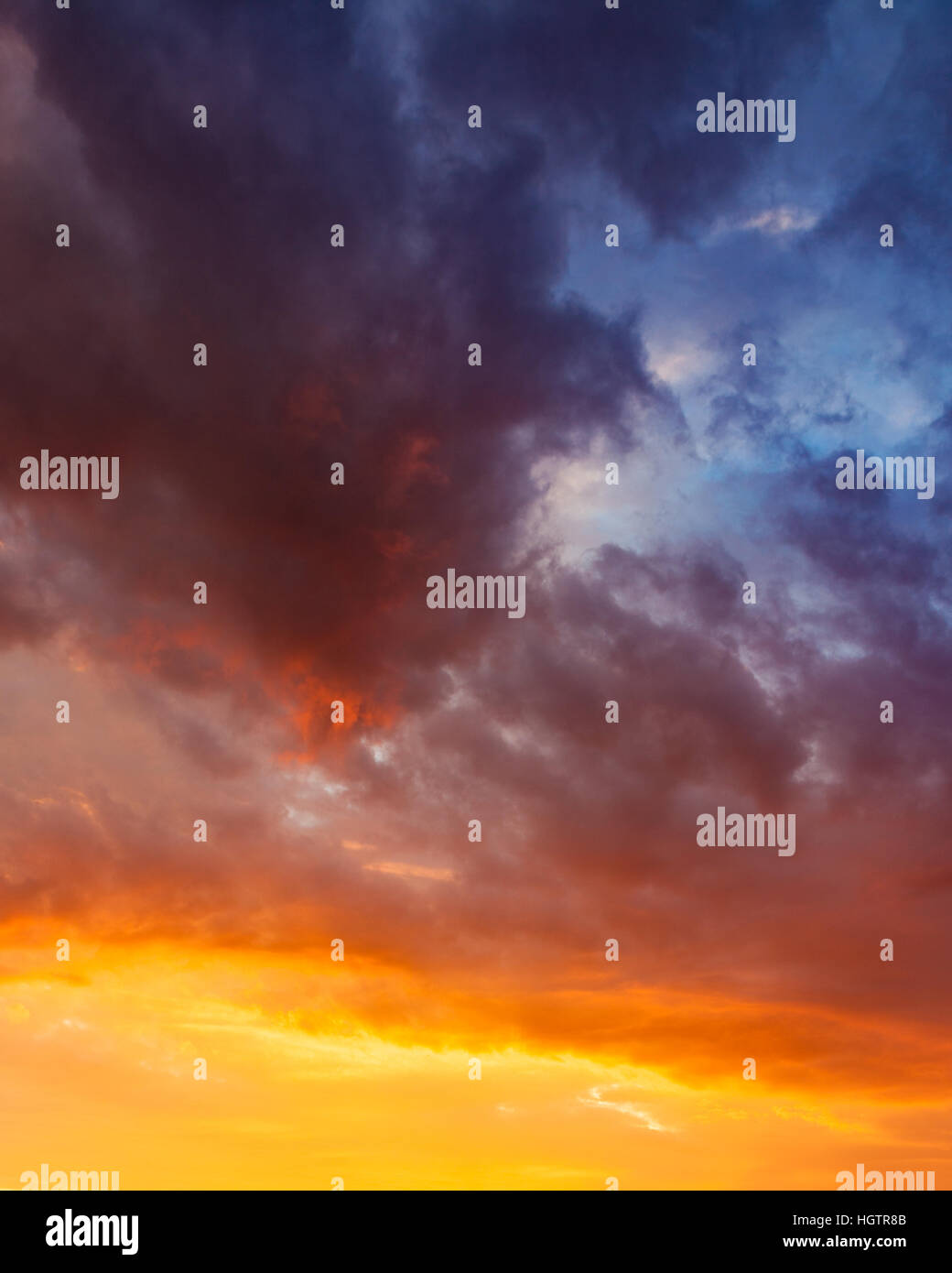 Fiery vivid sunset sky clouds Stock Photo