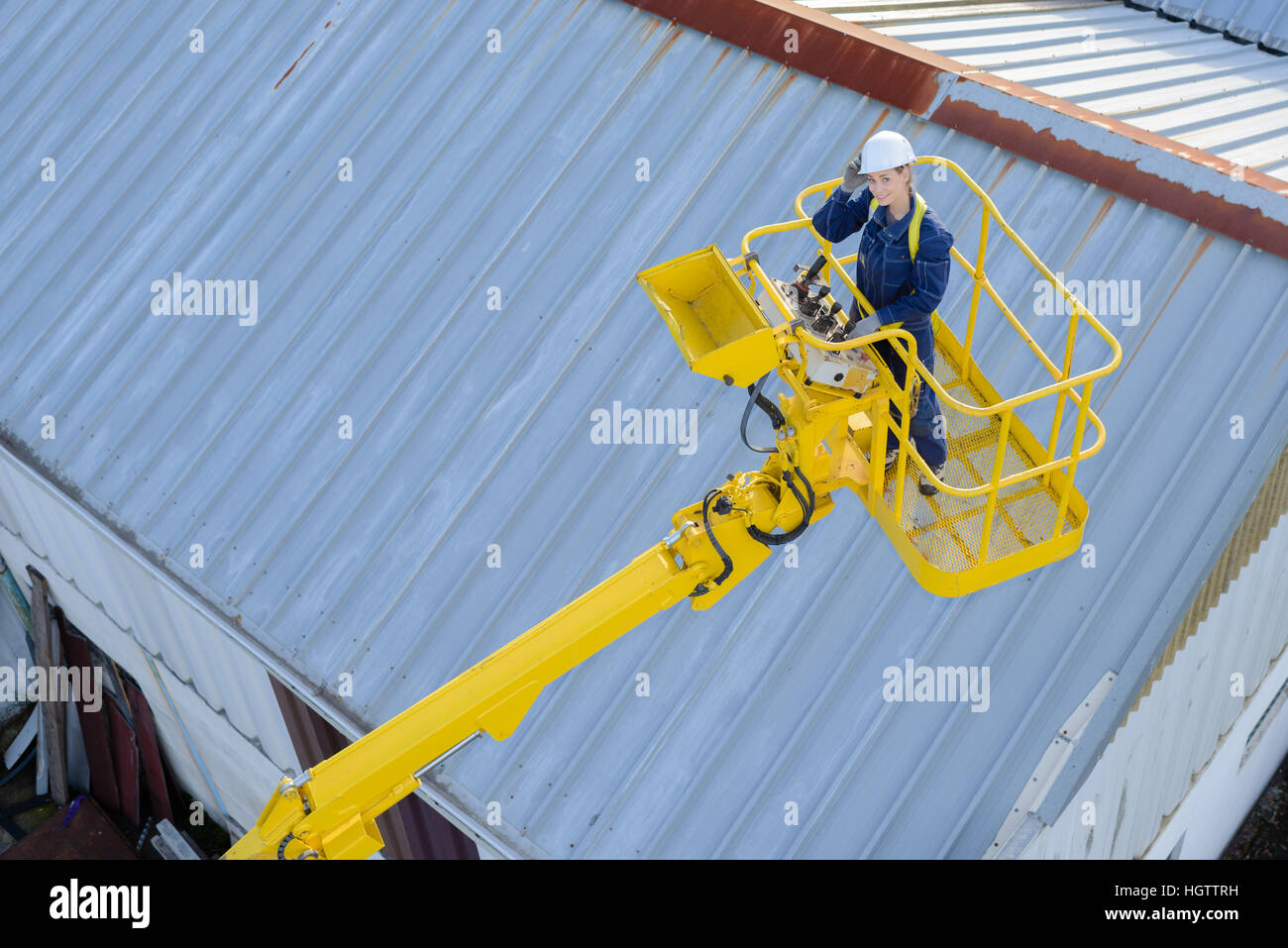 Lady in cherry picker Stock Photo Alamy
