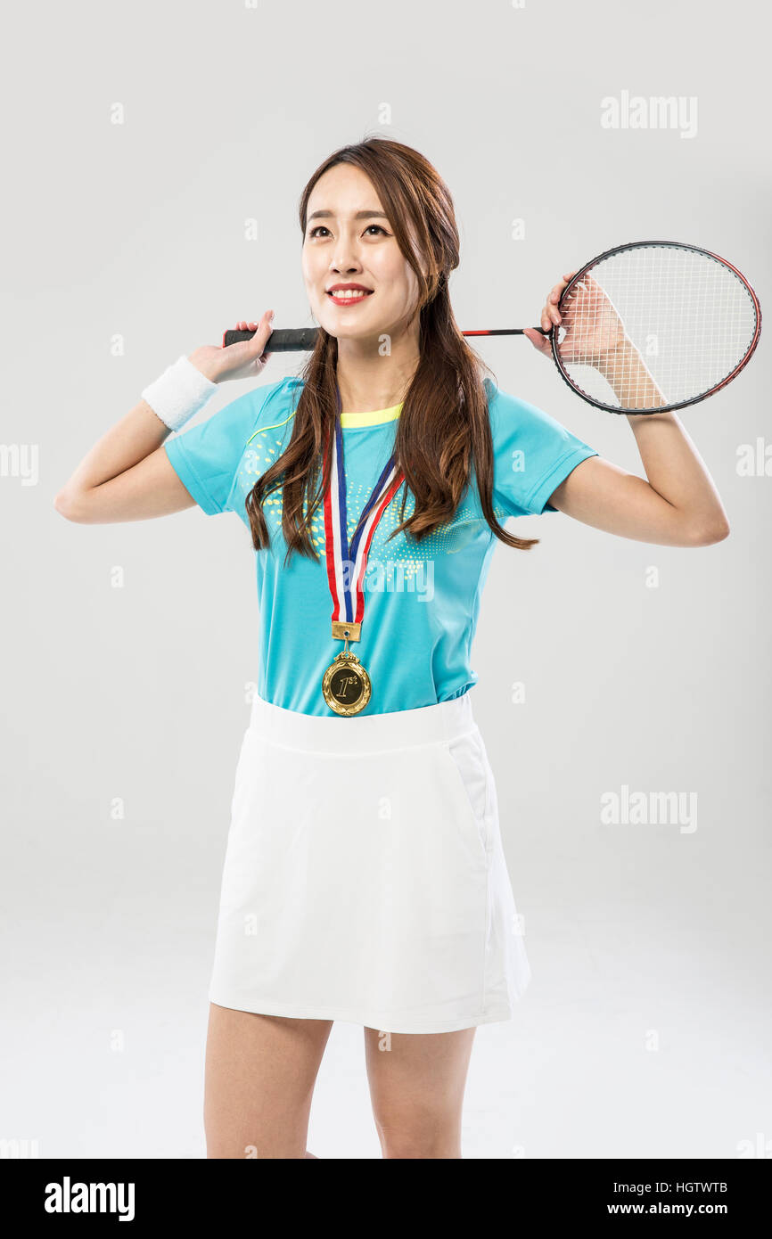 Young smiling Korean female badminton player with medal Stock Photo Alamy