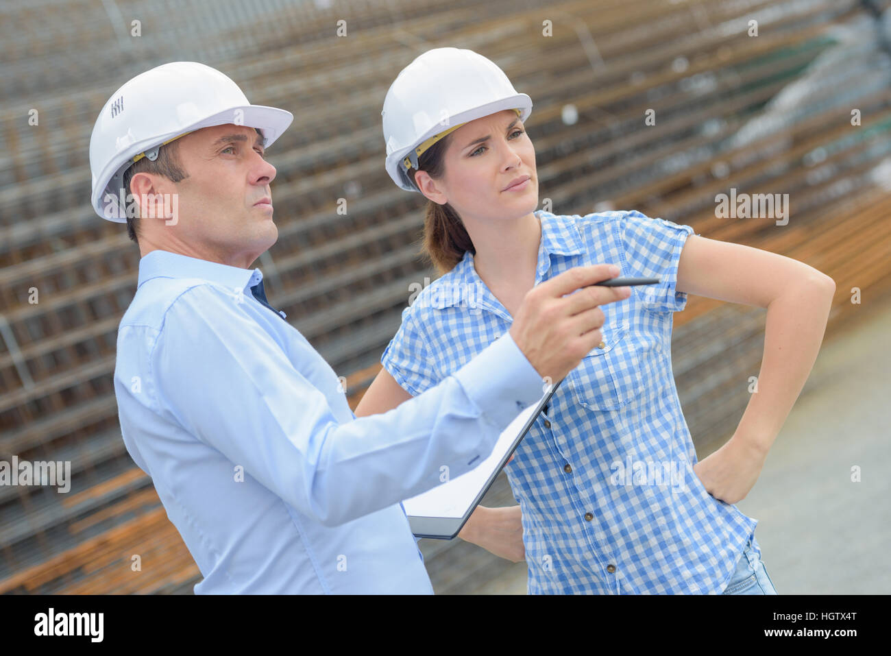 Engaged in designing. талантливые инженеры двое. талантливые инженеры двое. счастливая профессия. талантливые инженеры двое.