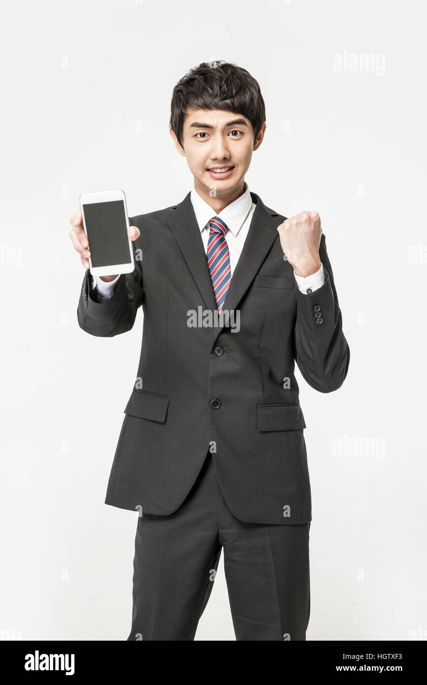 Man cheering smartphone hi-res stock photography and images - Alamy